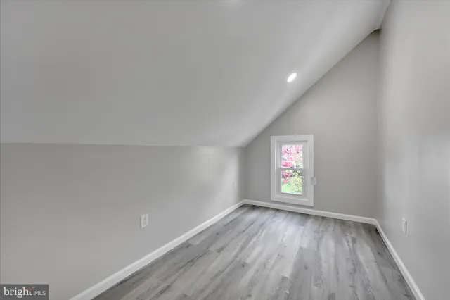 a view of a backyard with a garden and plants
