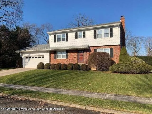 a view of a house with a big yard