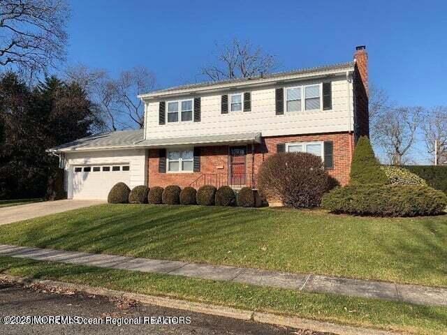 a view of a house with a big yard