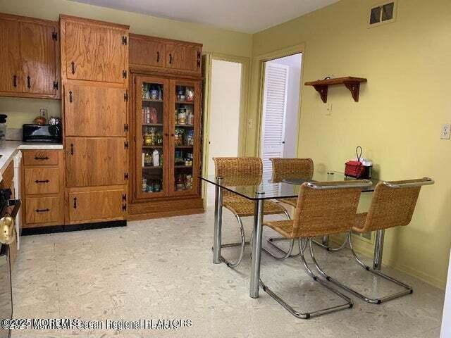 503 Wildwood Road West Allenhurst, NJ 07711 - Photo 5 of 12 a living room with furniture