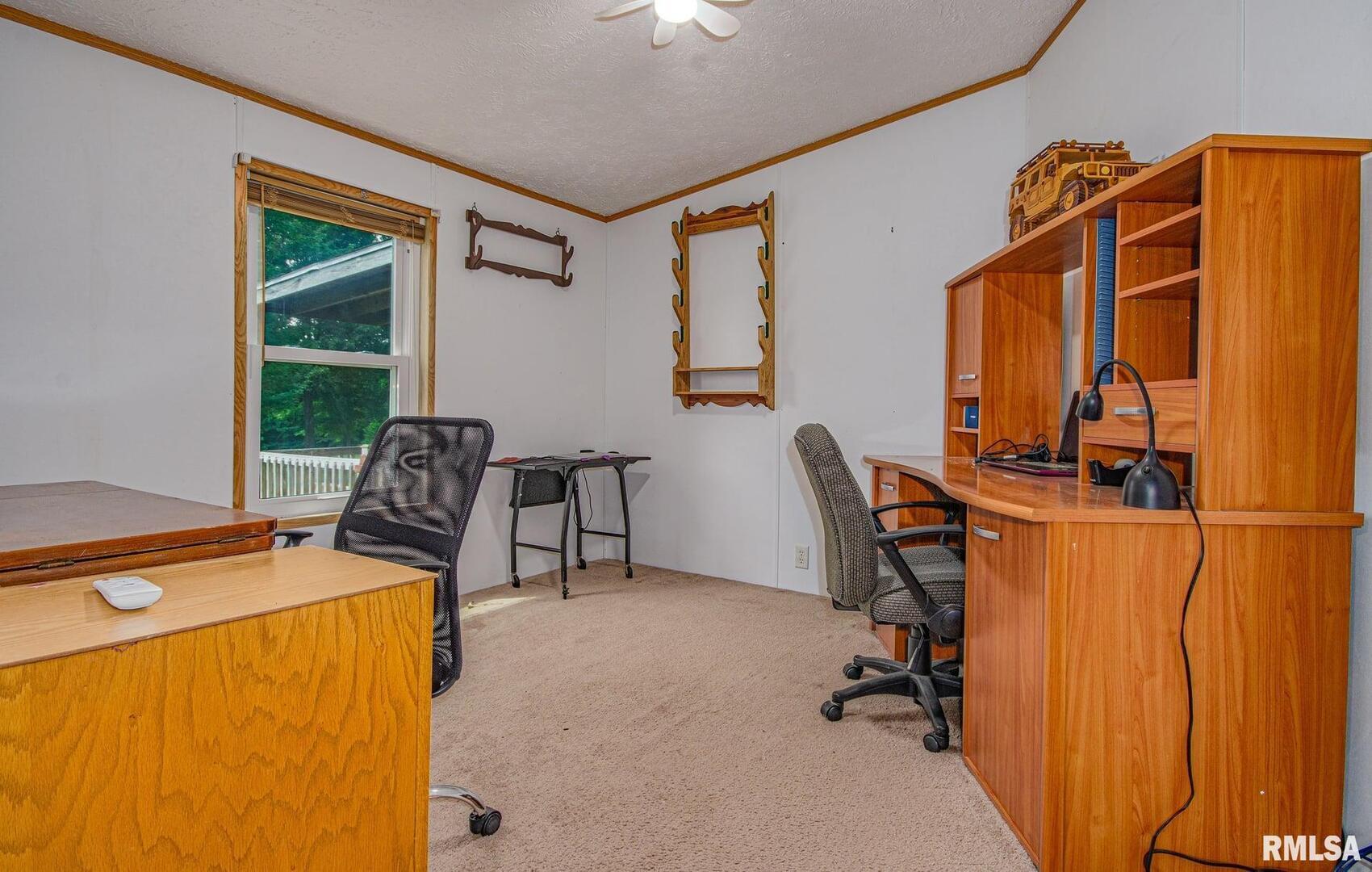 16807 East Kendall Road Mount Vernon, IL 62864 - Photo 12 of 28 a view of a workspace with furniture and a window