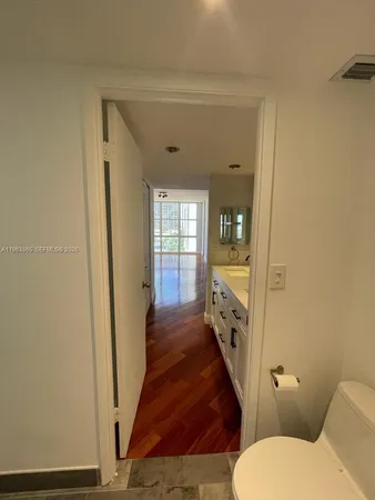 a bathroom with a sink and toilet