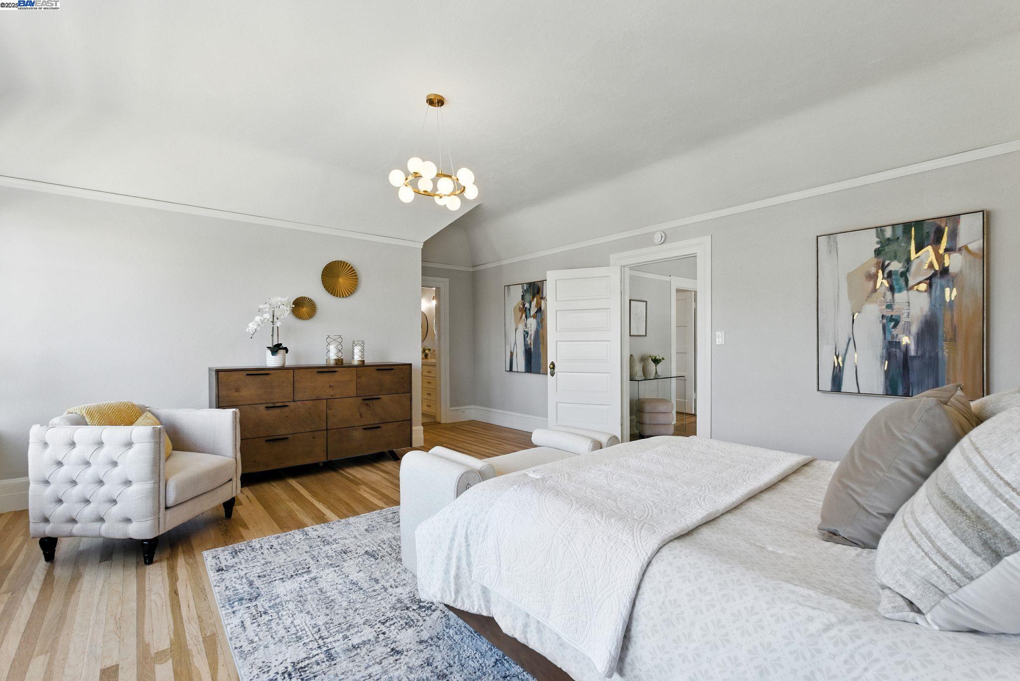 1247 Sherman Street Alameda, CA 94501 - Photo 32 of 50 a bedroom with a bed and wooden floor