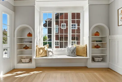 a view of a chairs and table in the roof deck