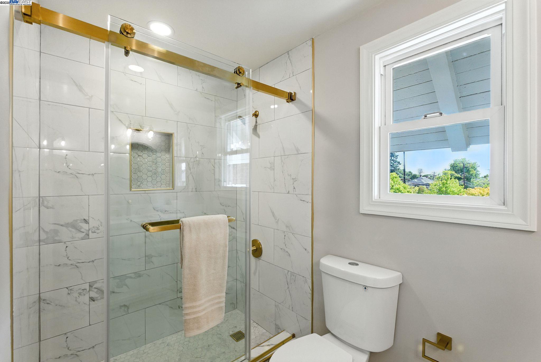 1247 Sherman Street Alameda, CA 94501 - Photo 42 of 50 a bathroom with a shower a toilet and a shower