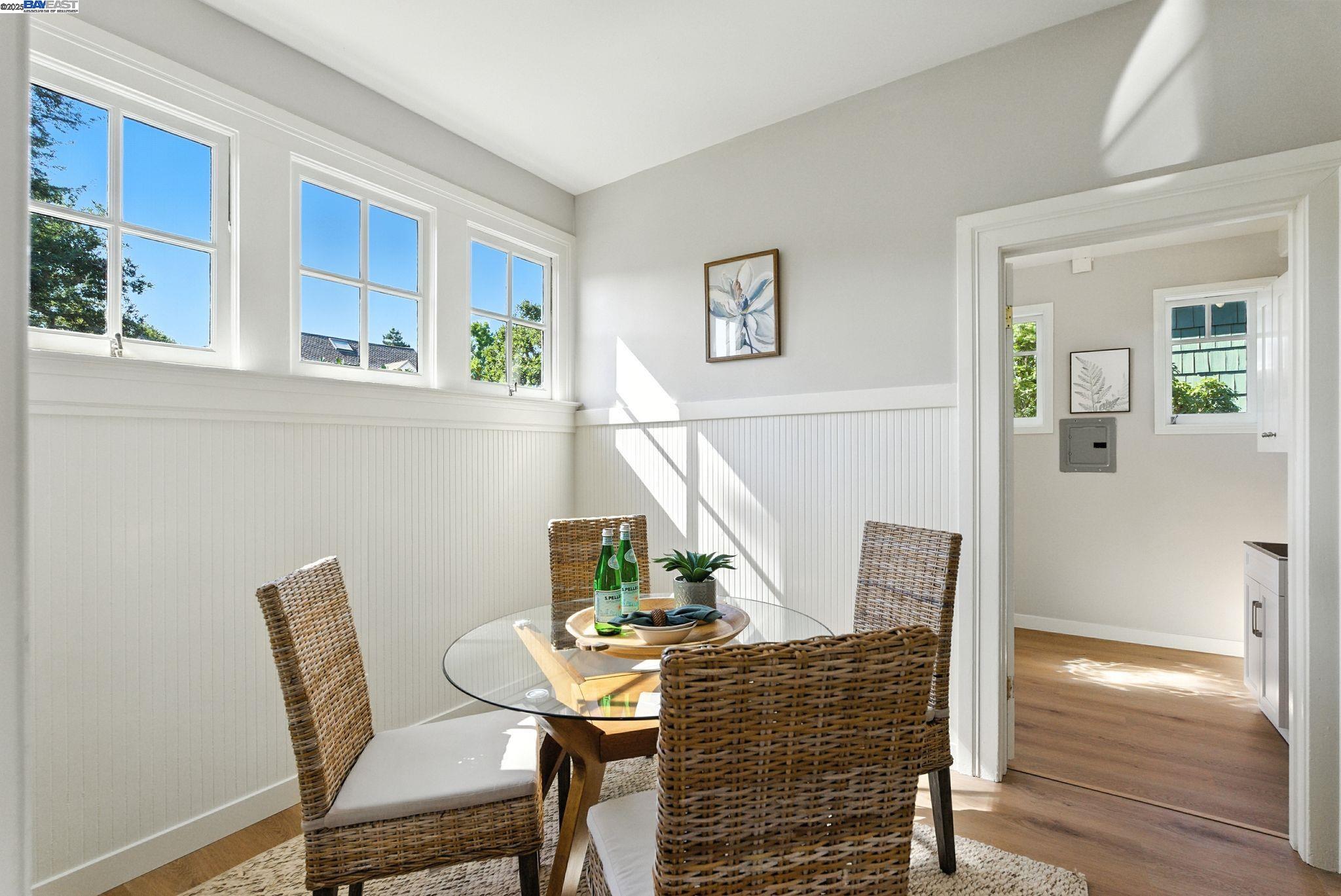 1247 Sherman Street Alameda, CA 94501 - Photo 45 of 50 a view of a dining room with furniture window and wooden floor