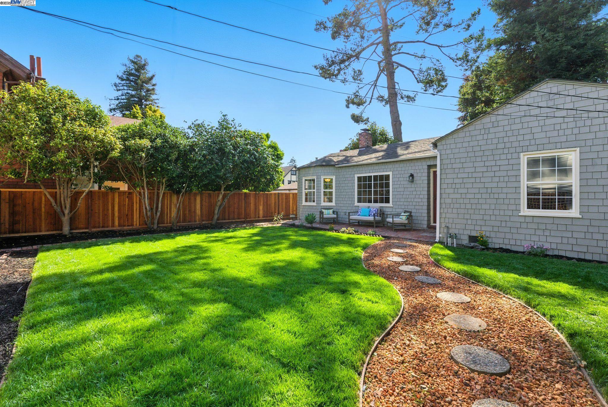 1247 Sherman Street Alameda, CA 94501 - Photo 5 of 50 a front view of a house with garden