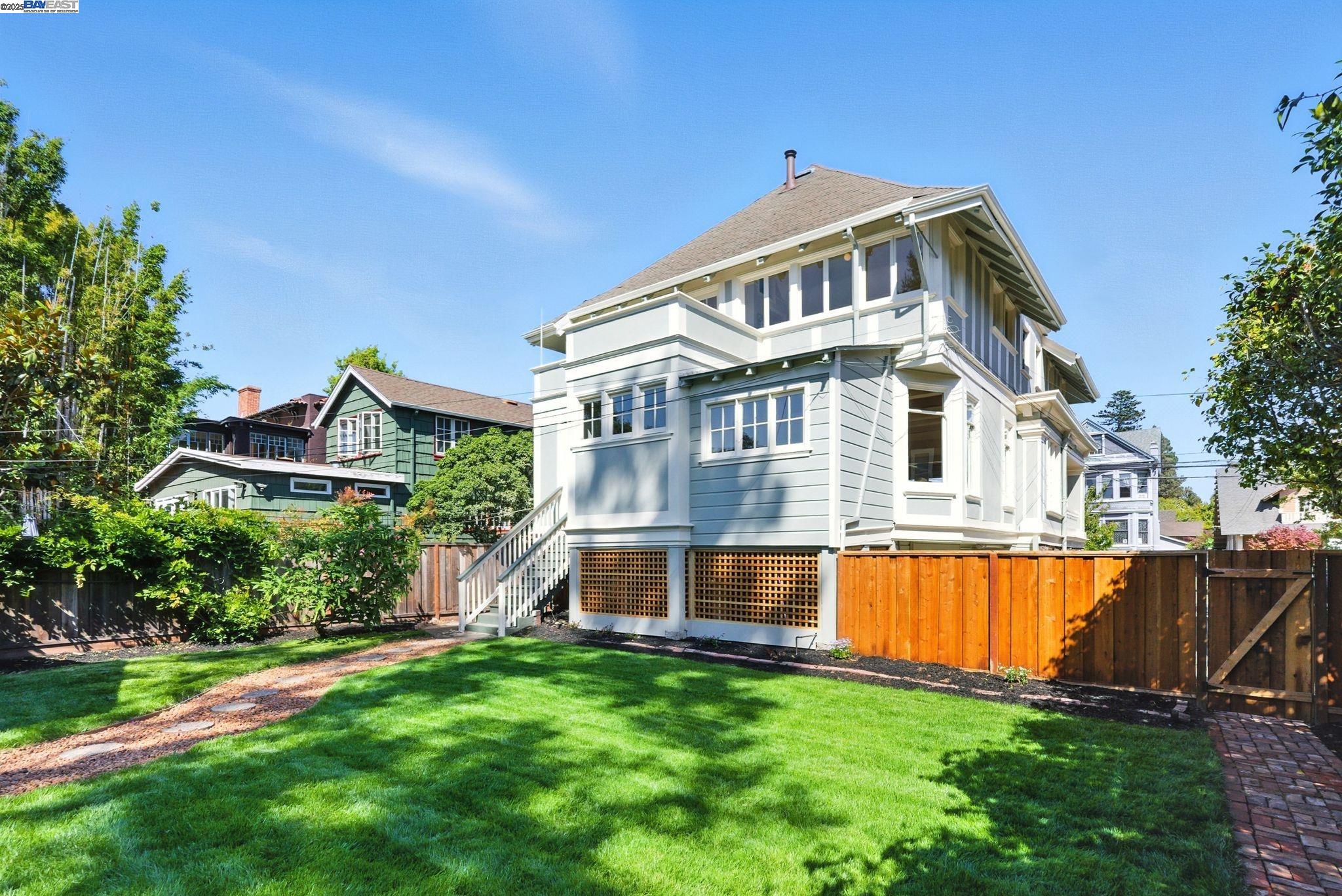 1247 Sherman Street Alameda, CA 94501 - Photo 8 of 50 a front view of a house with a yard