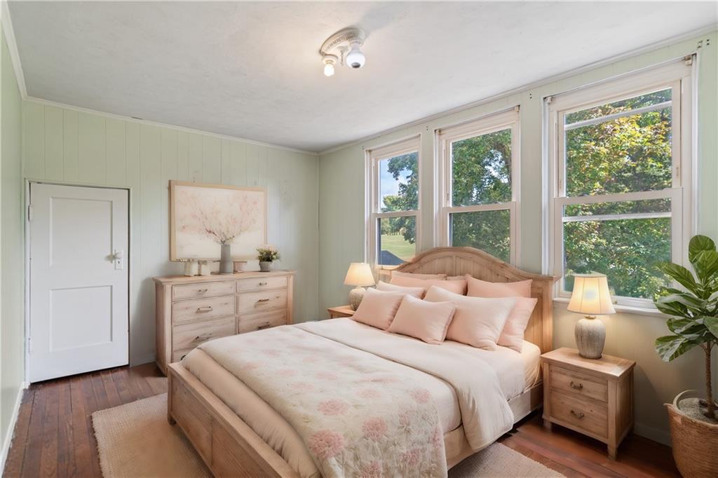 718 Mercer Road Beaver Falls, PA 15010 - Photo 22 of 44 a bedroom with a large bed and windows