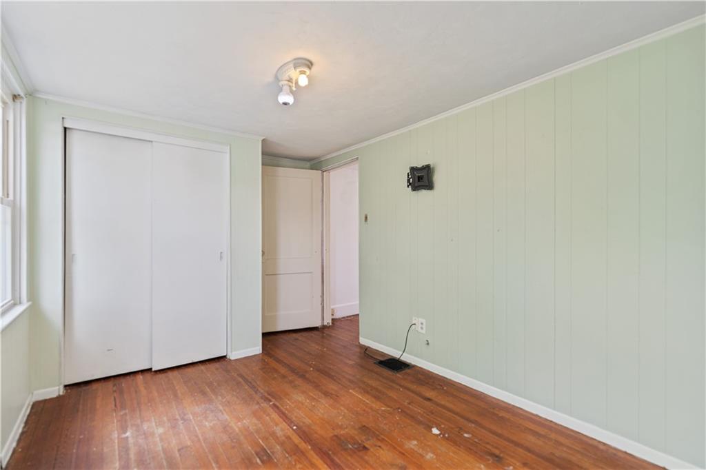 718 Mercer Road Beaver Falls, PA 15010 - Photo 23 of 44 a view of a room with wooden floor