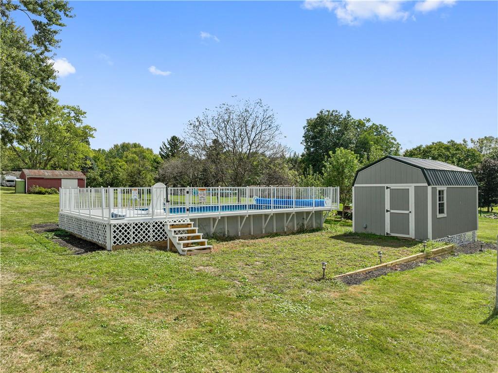 718 Mercer Road Beaver Falls, PA 15010 - Photo 30 of 44 a view of a garden with house in the background