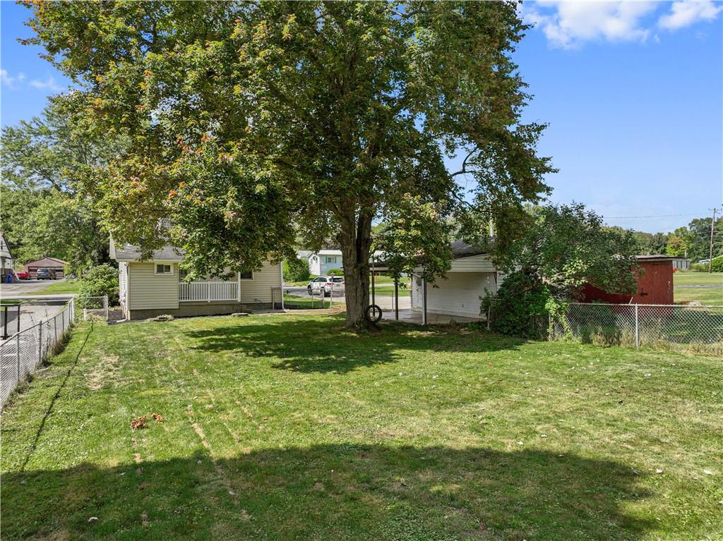 718 Mercer Road Beaver Falls, PA 15010 - Photo 40 of 44 a backyard of a house with lots of green space