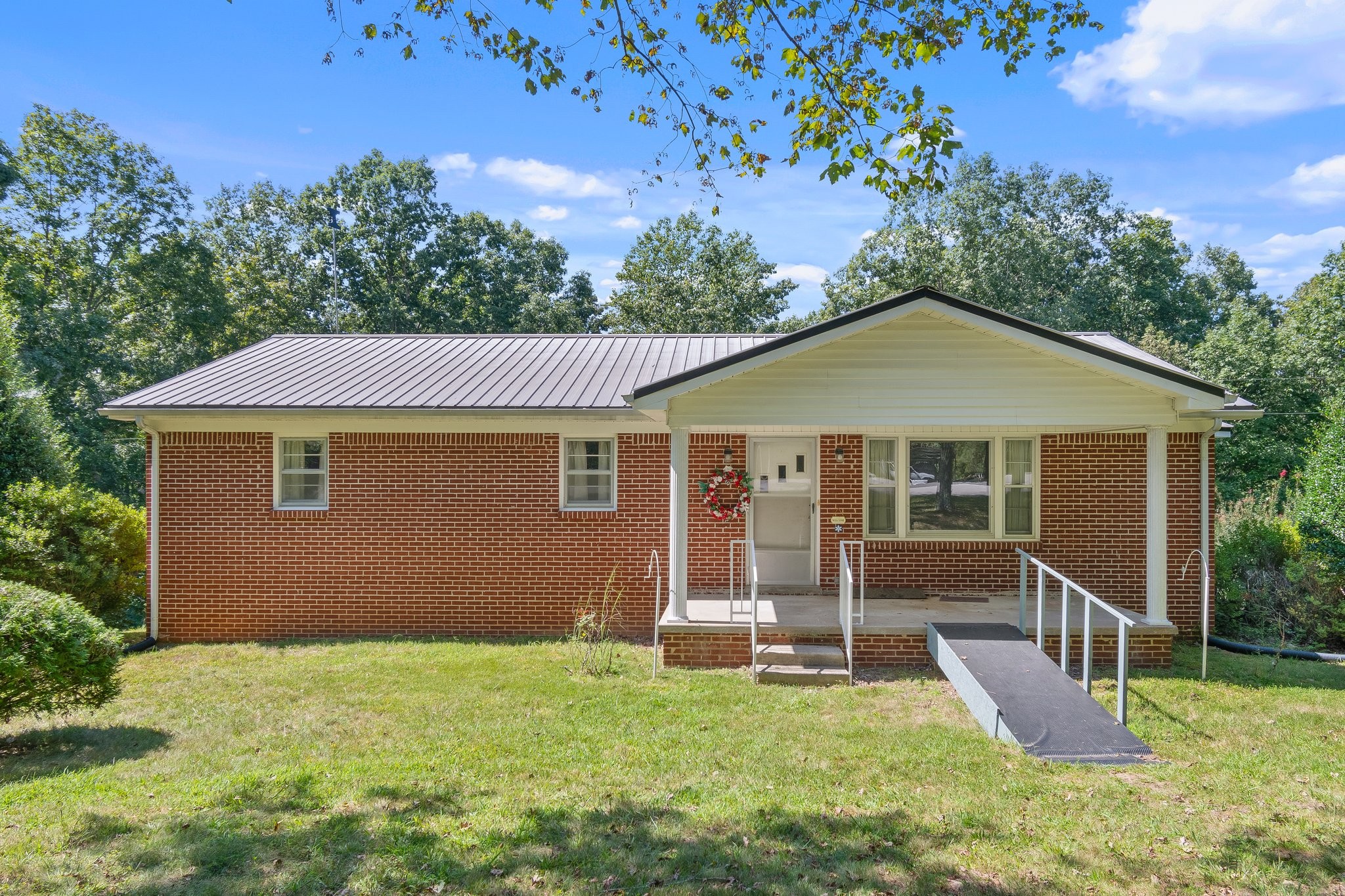1875 Grays Bend Road Centerville, TN 37033 - Photo 2 of 33 a front view of a house with a yard