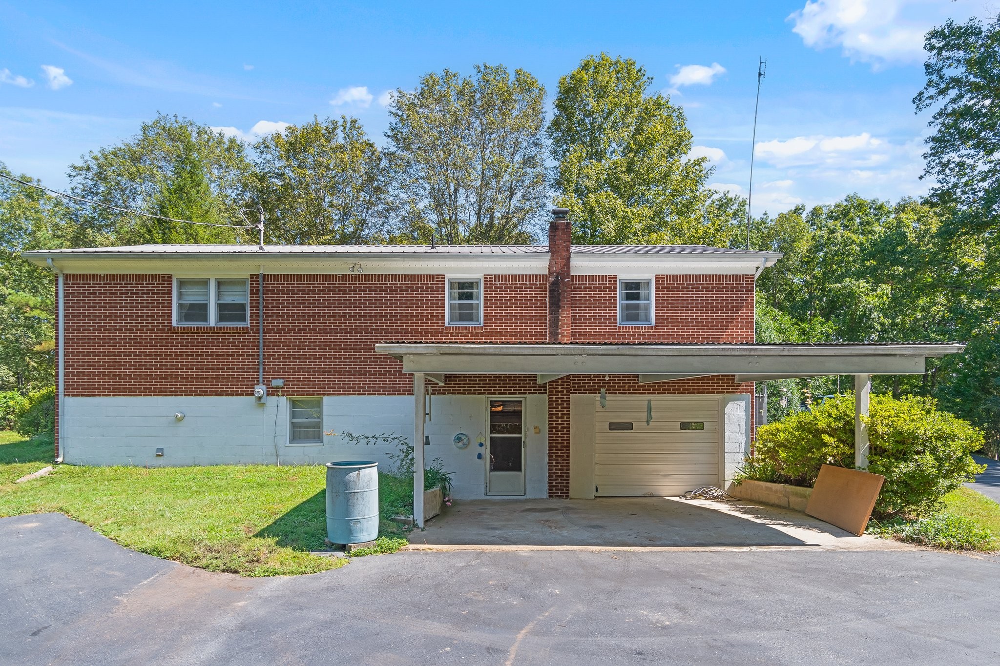 1875 Grays Bend Road Centerville, TN 37033 - Photo 23 of 33 a front view of a house with a yard and garage