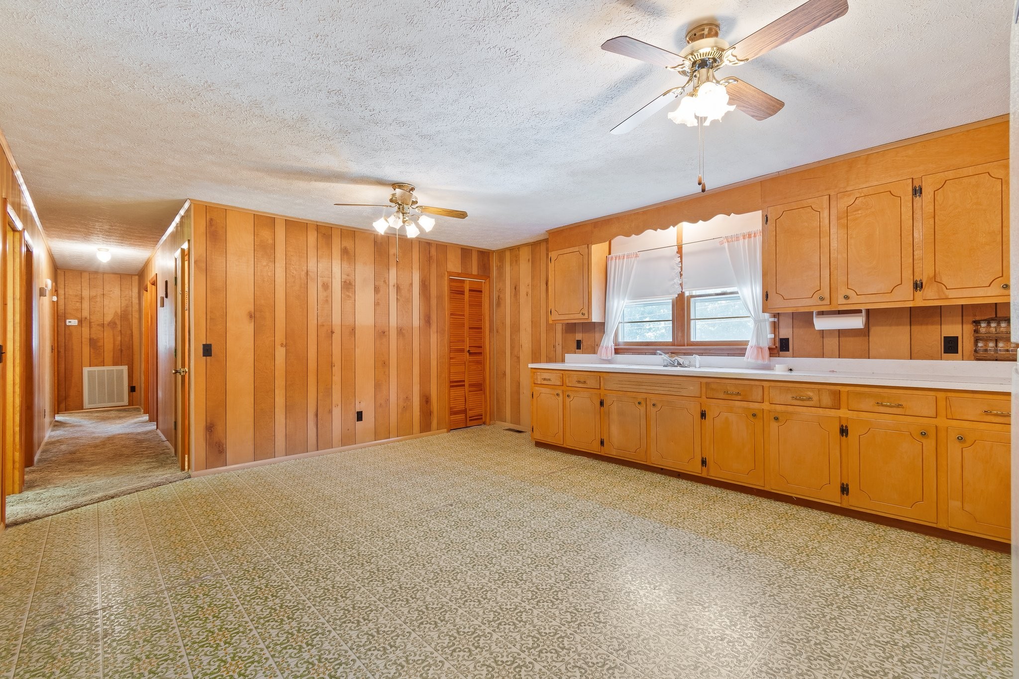 1875 Grays Bend Road Centerville, TN 37033 - Photo 10 of 33 a large white kitchen with a large window