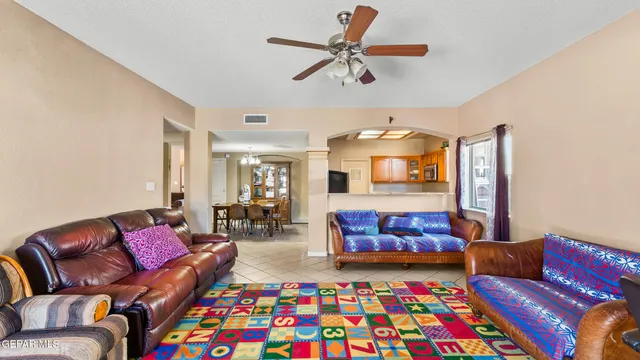 a living room with furniture and a couch