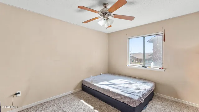 a room with a bed and a window