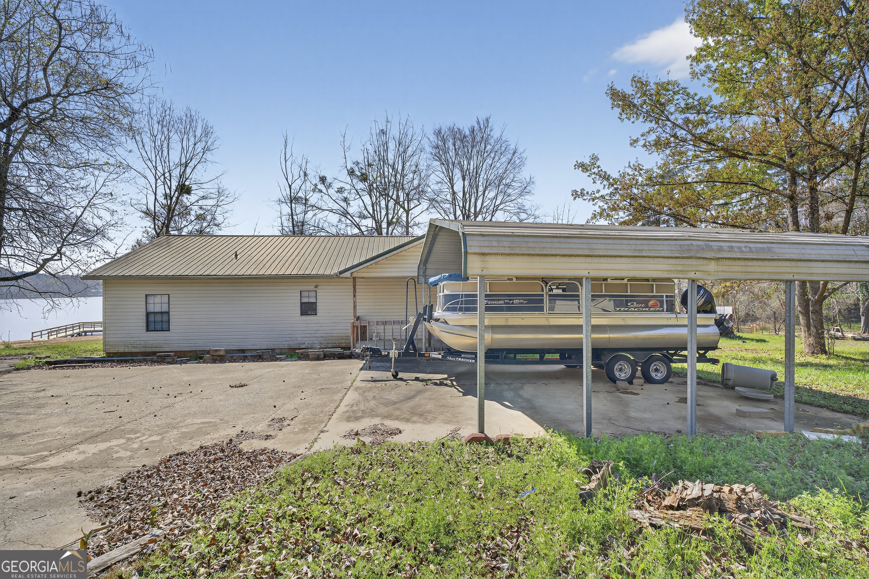 231 B Little Road Northwest Milledgeville, GA 31061 - Photo 4 of 67 a backyard of a house with table and chairs