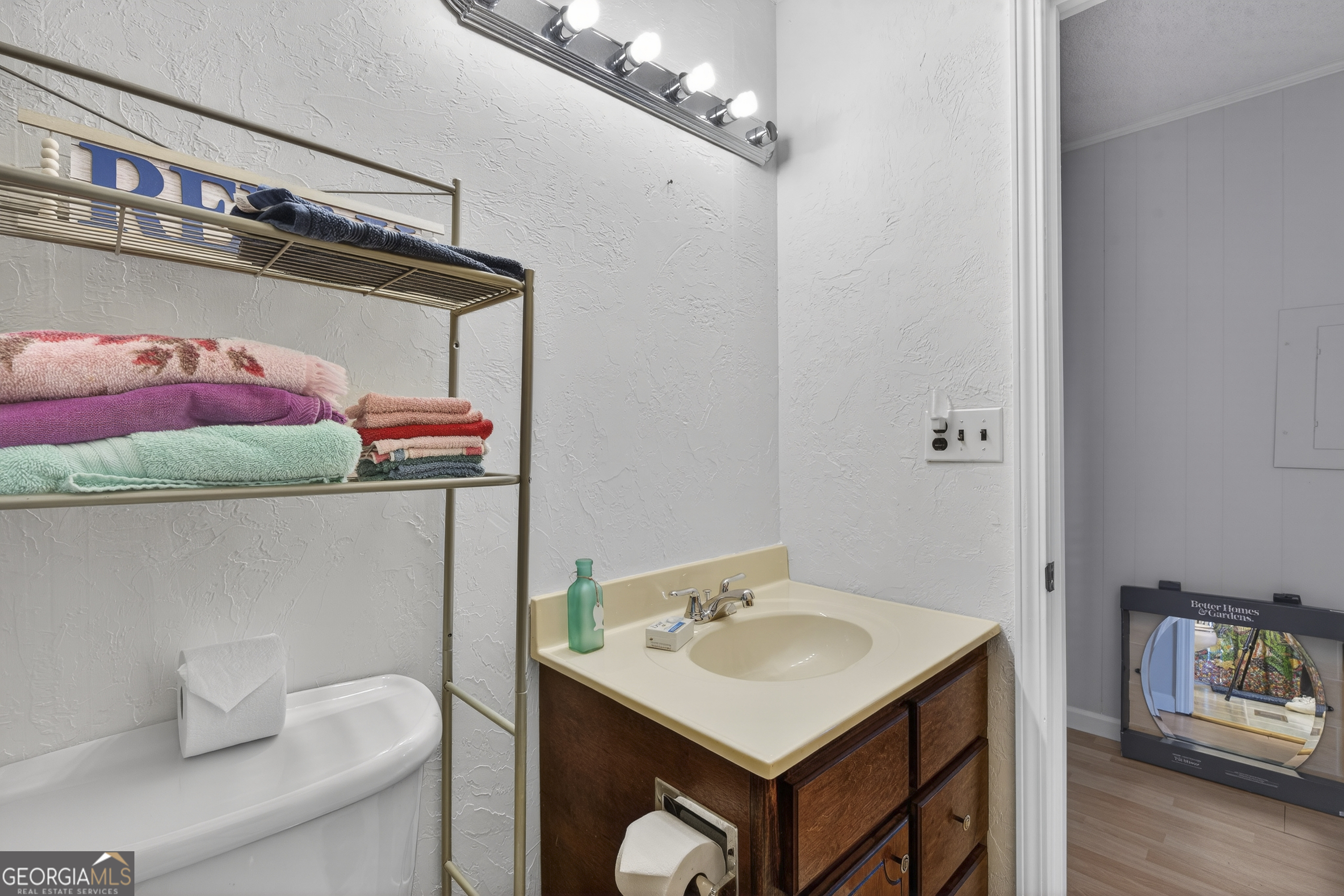 231 B Little Road Northwest Milledgeville, GA 31061 - Photo 45 of 67 a bathroom with a sink toilet and a mirror