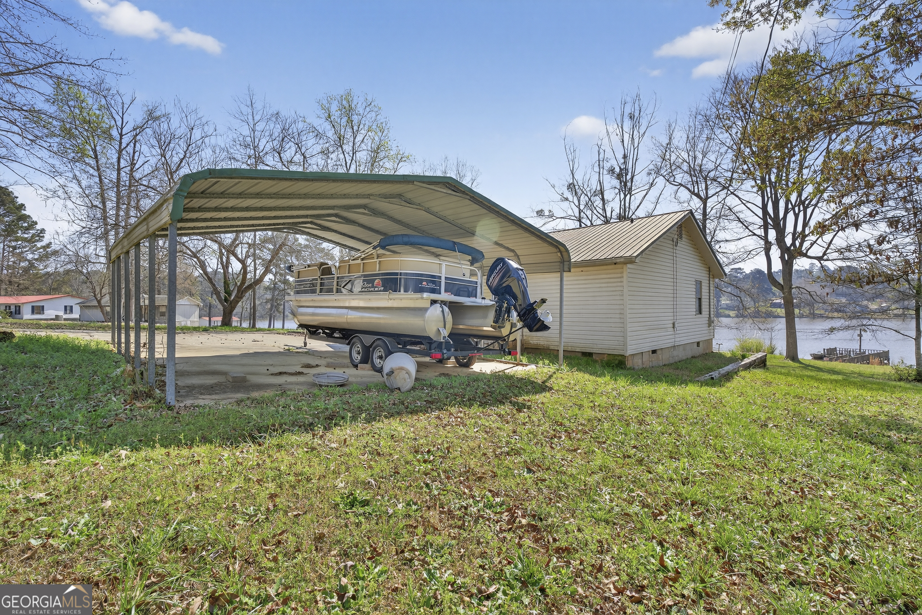 231 B Little Road Northwest Milledgeville, GA 31061 - Photo 5 of 67 a view of a house with a backyard