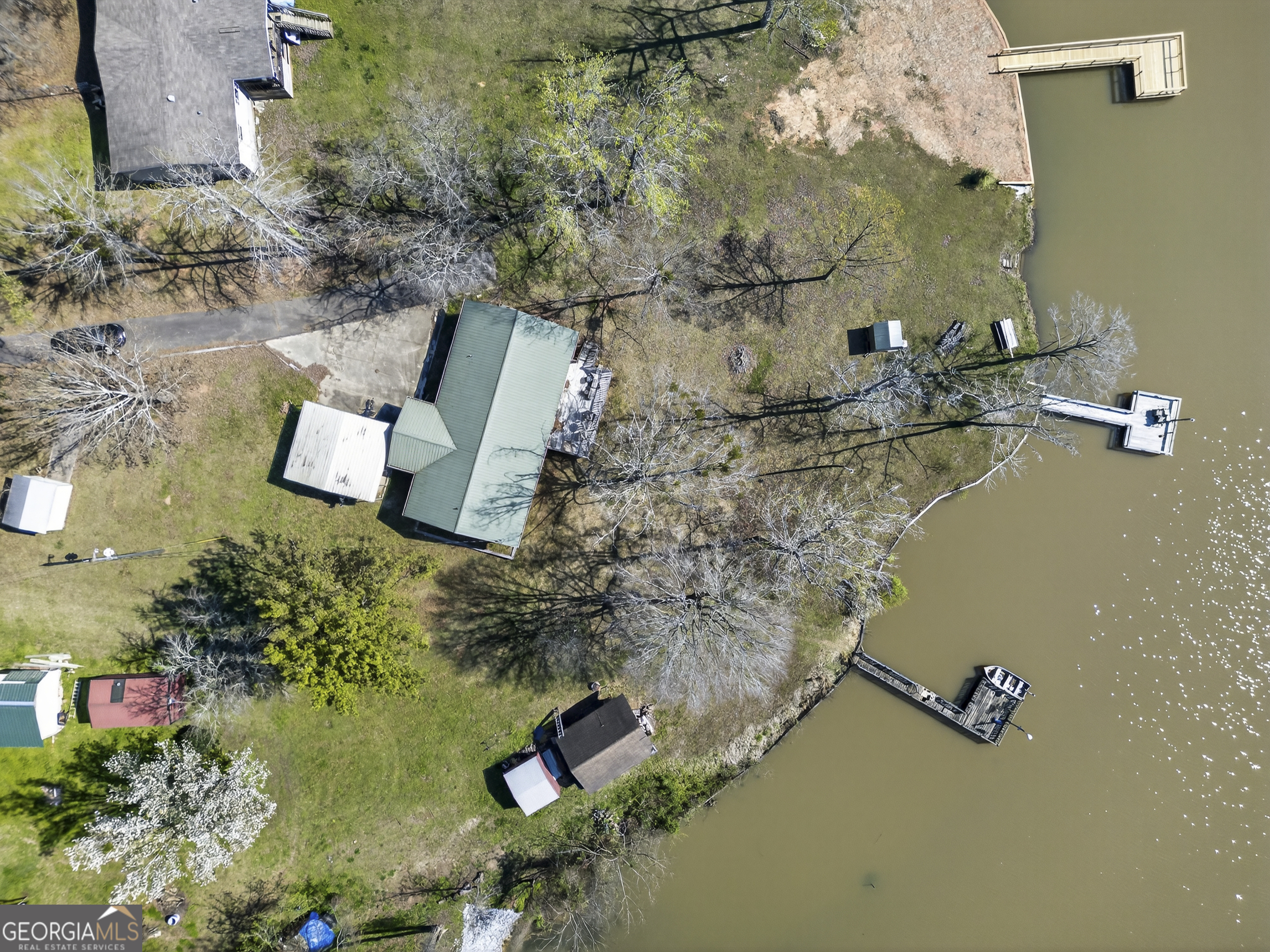 231 B Little Road Northwest Milledgeville, GA 31061 - Photo 67 of 67 an aerial view of a house with a yard