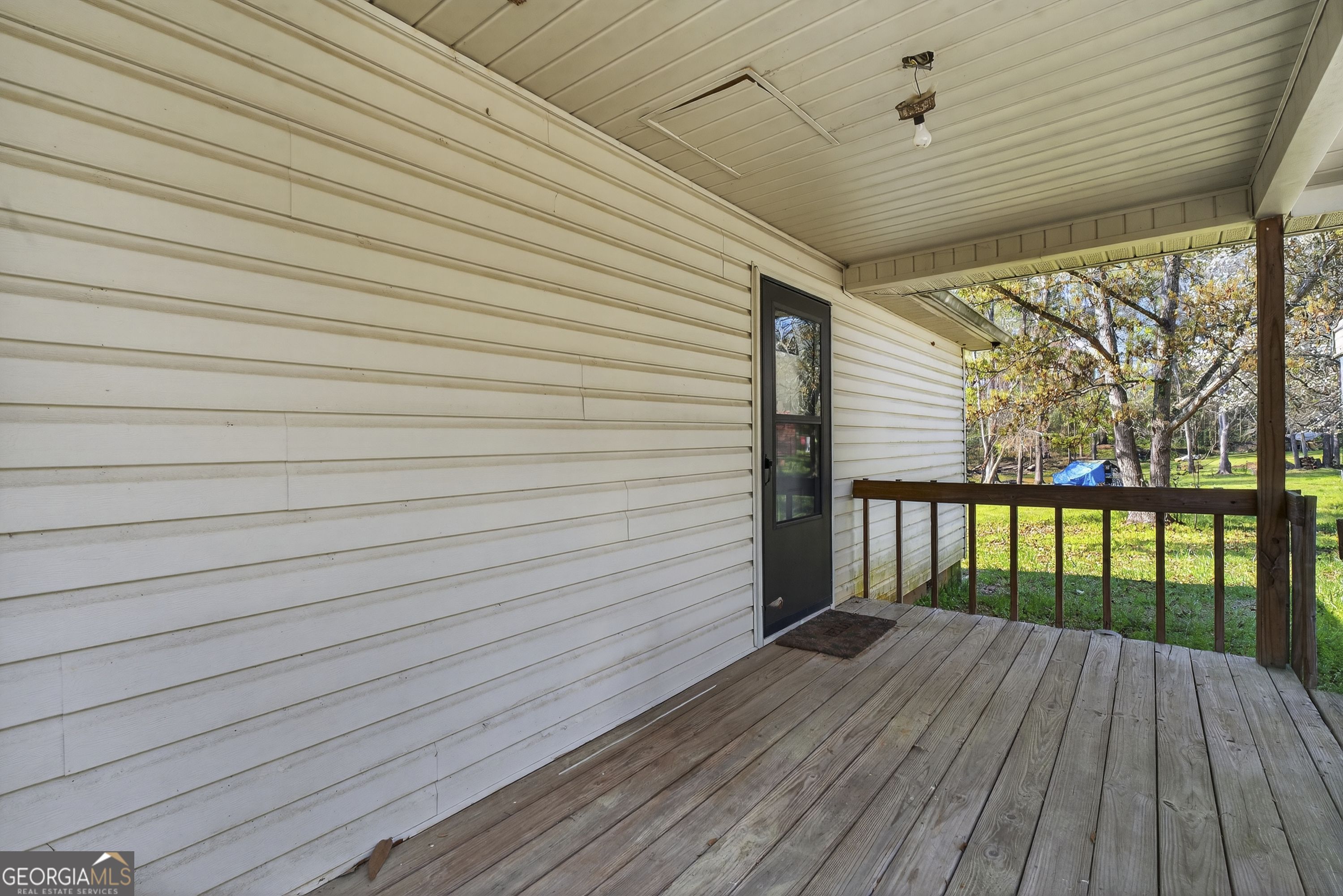 231 B Little Road Northwest Milledgeville, GA 31061 - Photo 8 of 67 a view of a balcony with wooden floor