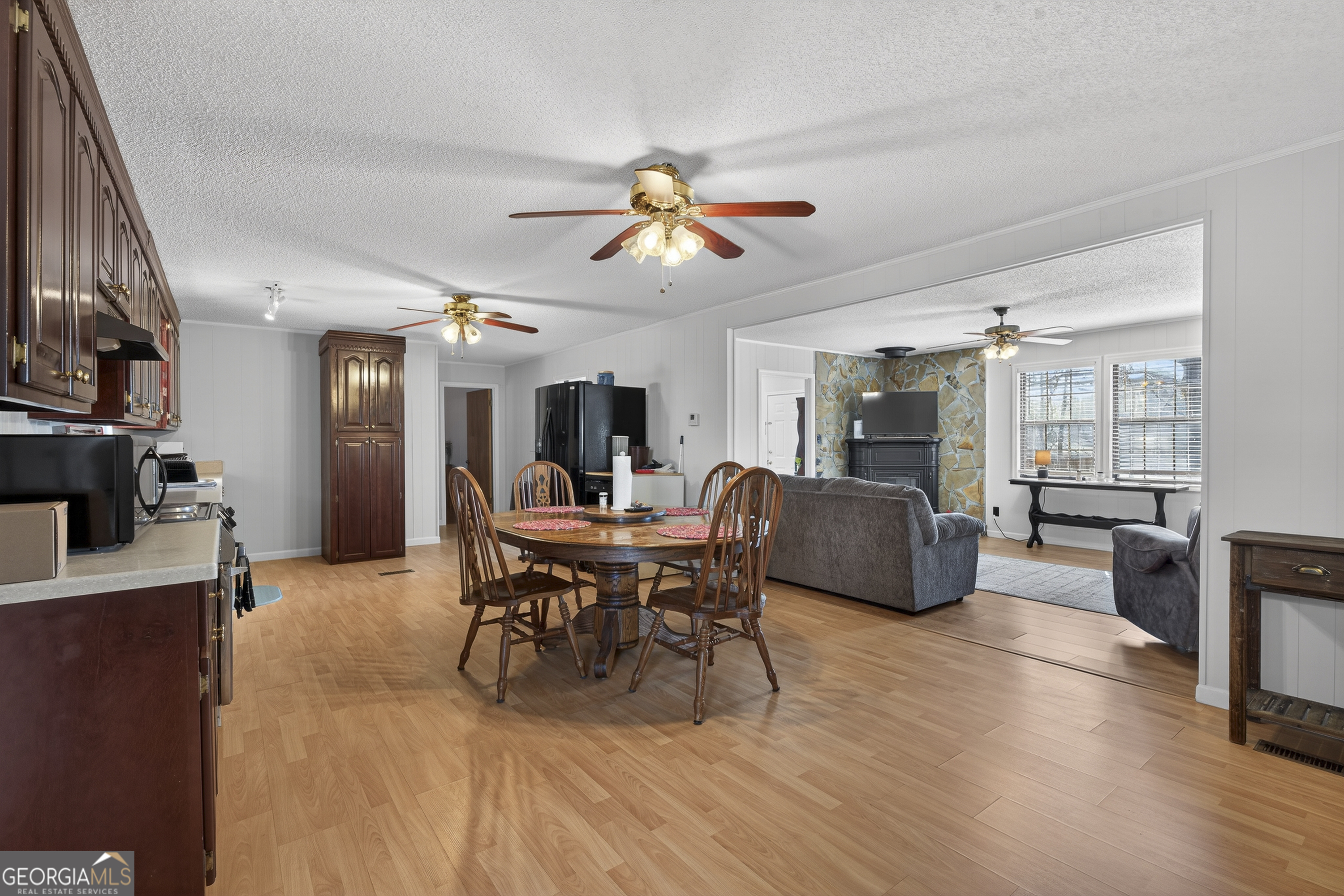 231 B Little Road Northwest Milledgeville, GA 31061 - Photo 10 of 67 a view of a dining room with furniture window and wooden floor