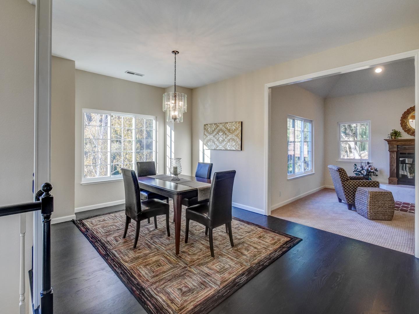 40 Nunes Road Watsonville, CA 95076 - Photo 13 of 42 a view of a dining room with furniture window and wooden floor