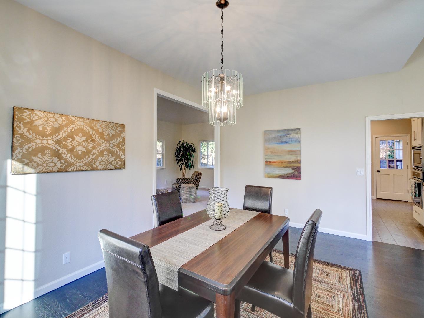 40 Nunes Road Watsonville, CA 95076 - Photo 15 of 42 a view of a dining room with furniture and wooden floor