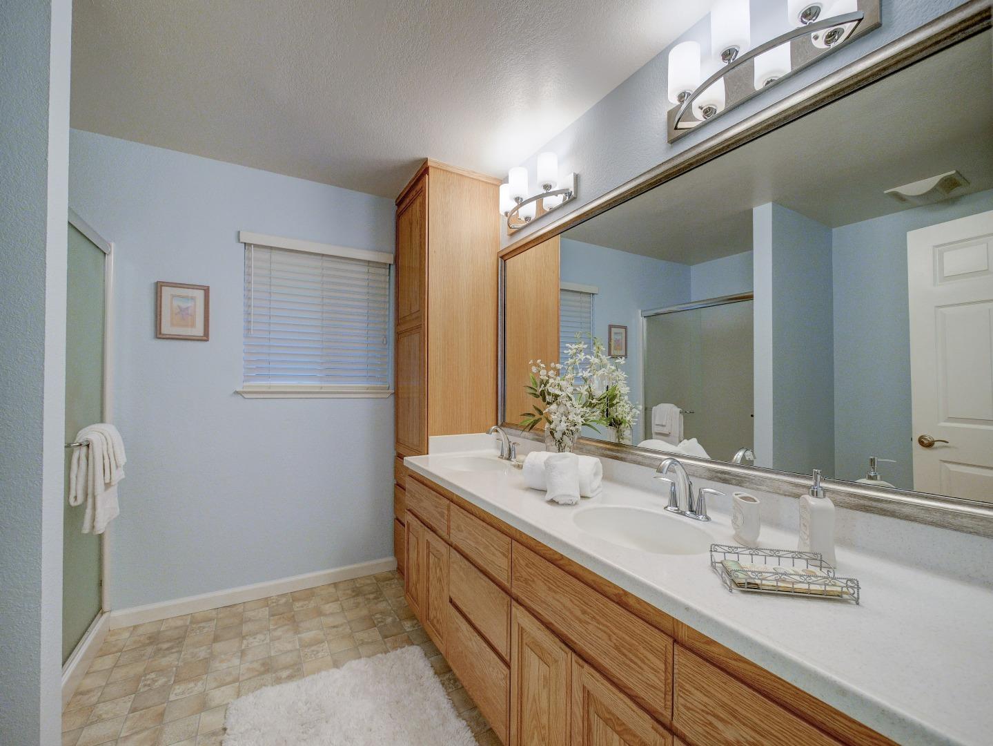 40 Nunes Road Watsonville, CA 95076 - Photo 24 of 42 a bathroom with a sink and a mirror