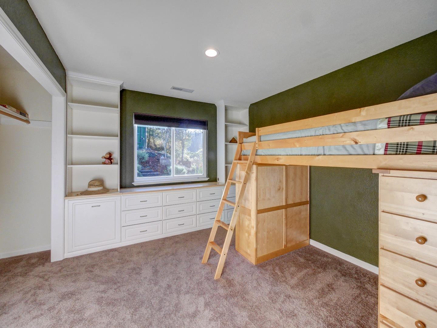 40 Nunes Road Watsonville, CA 95076 - Photo 27 of 42 a bedroom with a bed and a dresser