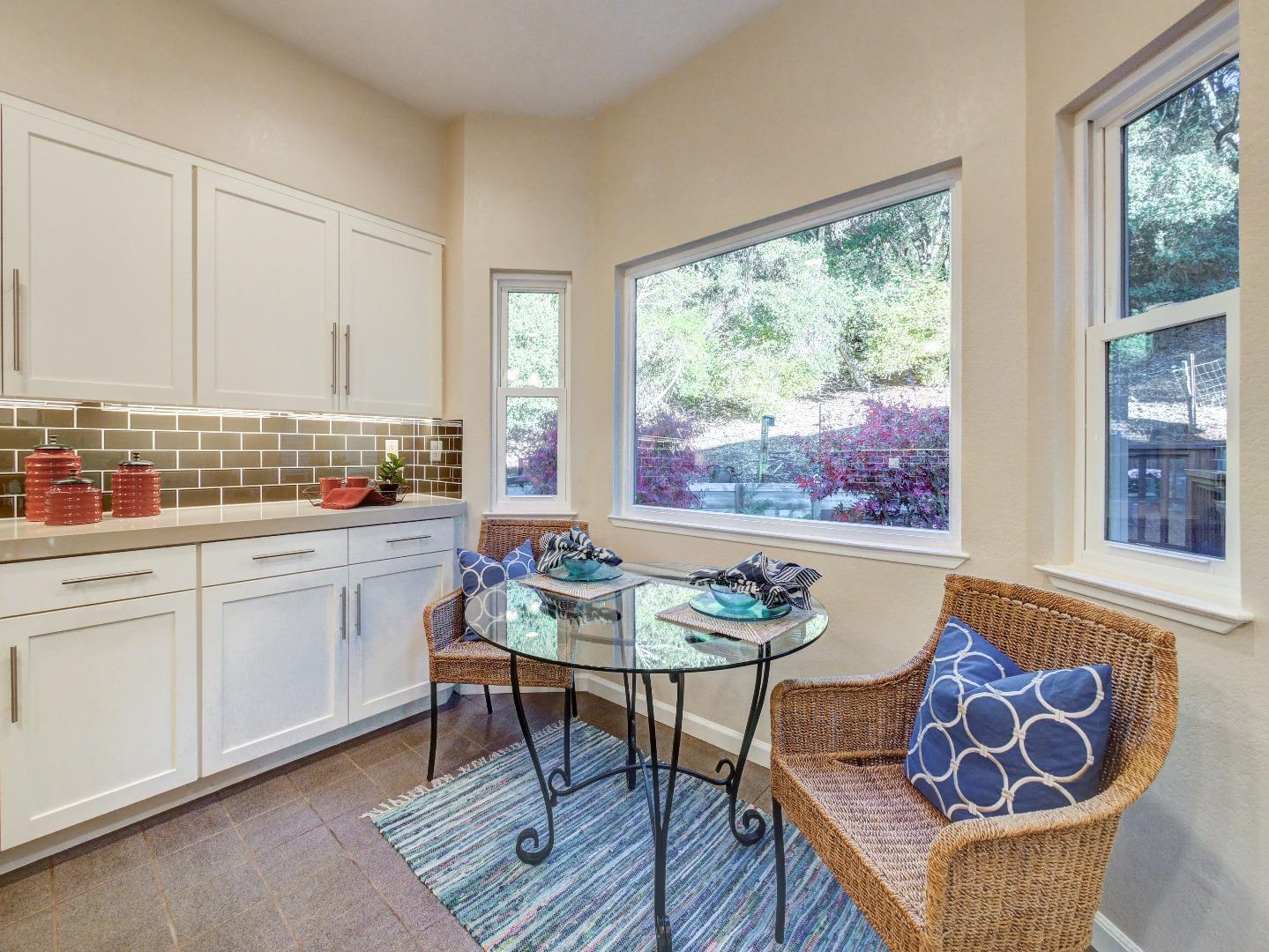 40 Nunes Road Watsonville, CA 95076 - Photo 3 of 42 a living room with furniture a table and a large window