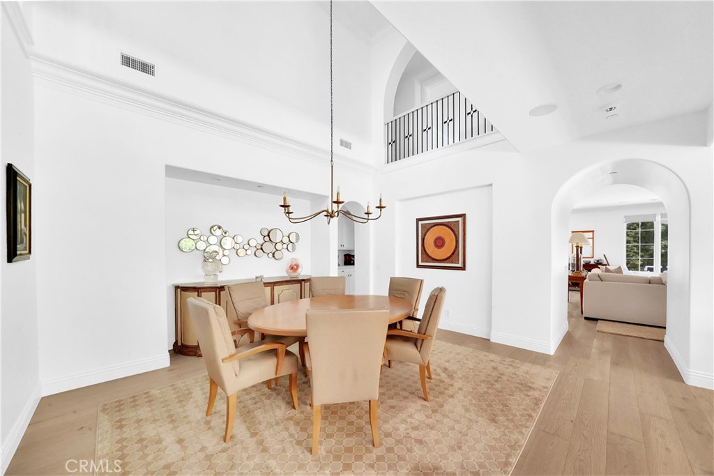 11 Hidden Pass Newport Coast, CA 92657 - Photo 11 of 59 a view of a dining room with furniture