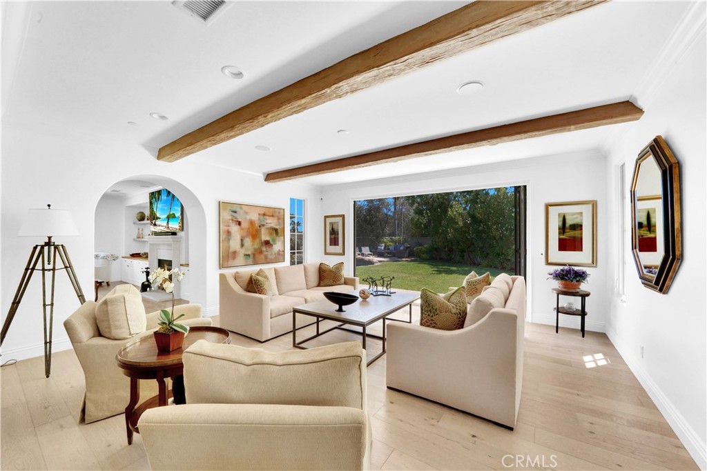 11 Hidden Pass Newport Coast, CA 92657 - Photo 13 of 59 a living room with furniture and a large window