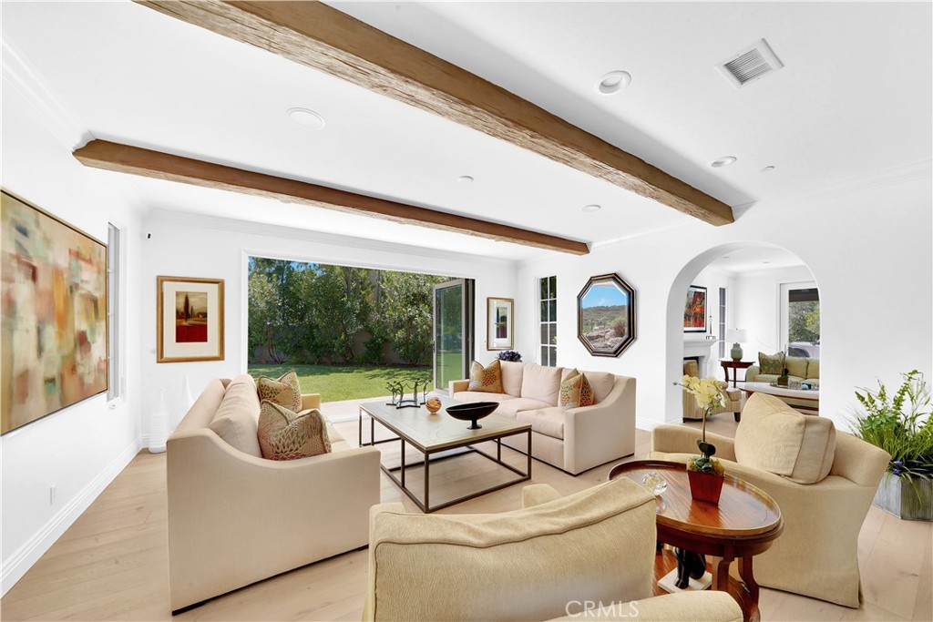 11 Hidden Pass Newport Coast, CA 92657 - Photo 14 of 59 a living room with furniture and a large window