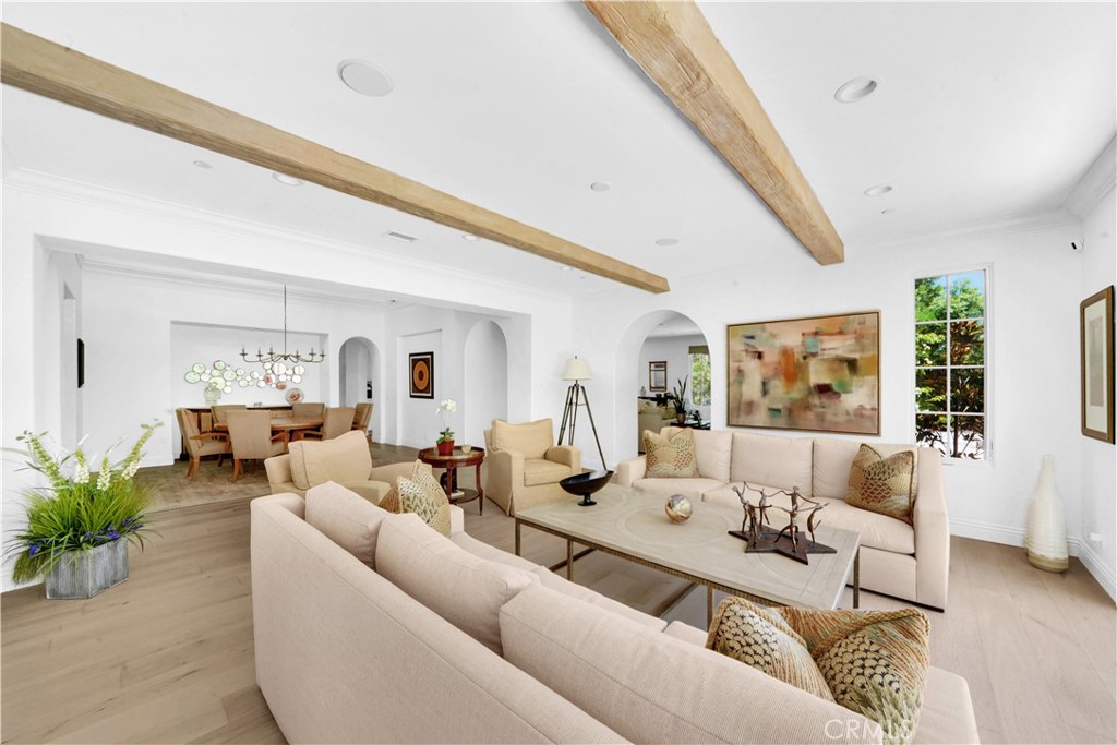 11 Hidden Pass Newport Coast, CA 92657 - Photo 16 of 59 a living room with furniture and wooden floor