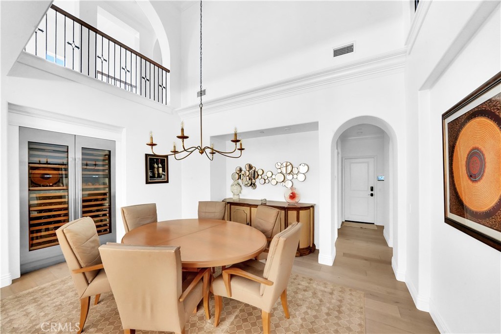 11 Hidden Pass Newport Coast, CA 92657 - Photo 31 of 59 a view of a dining room with furniture and window