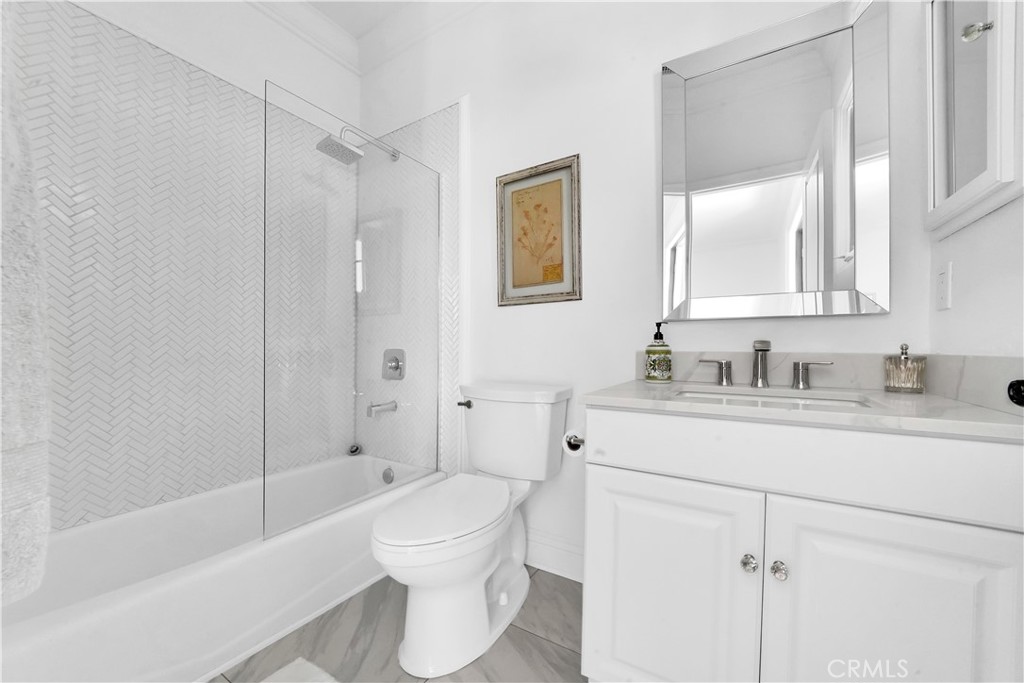 11 Hidden Pass Newport Coast, CA 92657 - Photo 35 of 59 a bathroom with a sink toilet and shower