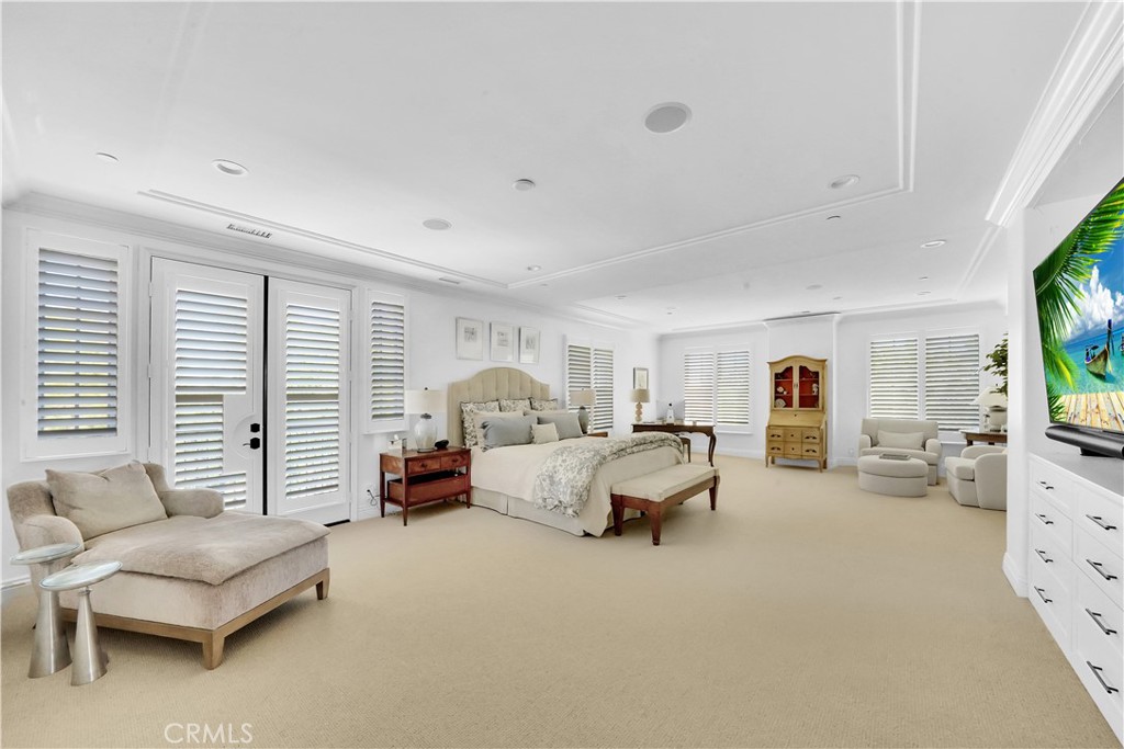 11 Hidden Pass Newport Coast, CA 92657 - Photo 42 of 59 a bed room with furniture and a large window