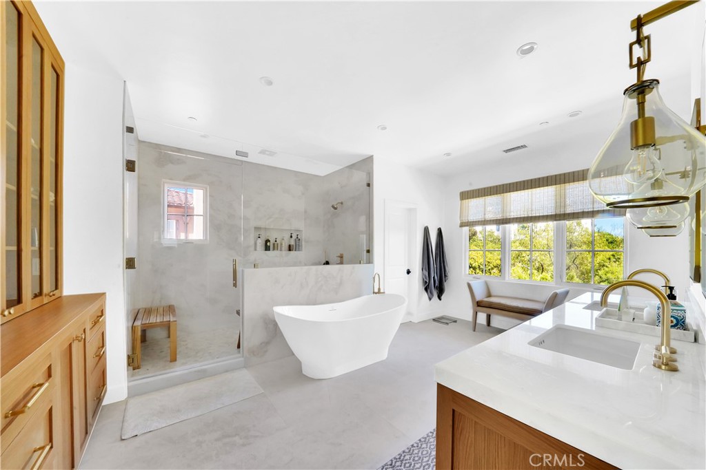 11 Hidden Pass Newport Coast, CA 92657 - Photo 46 of 59 a living room with furniture and a large window