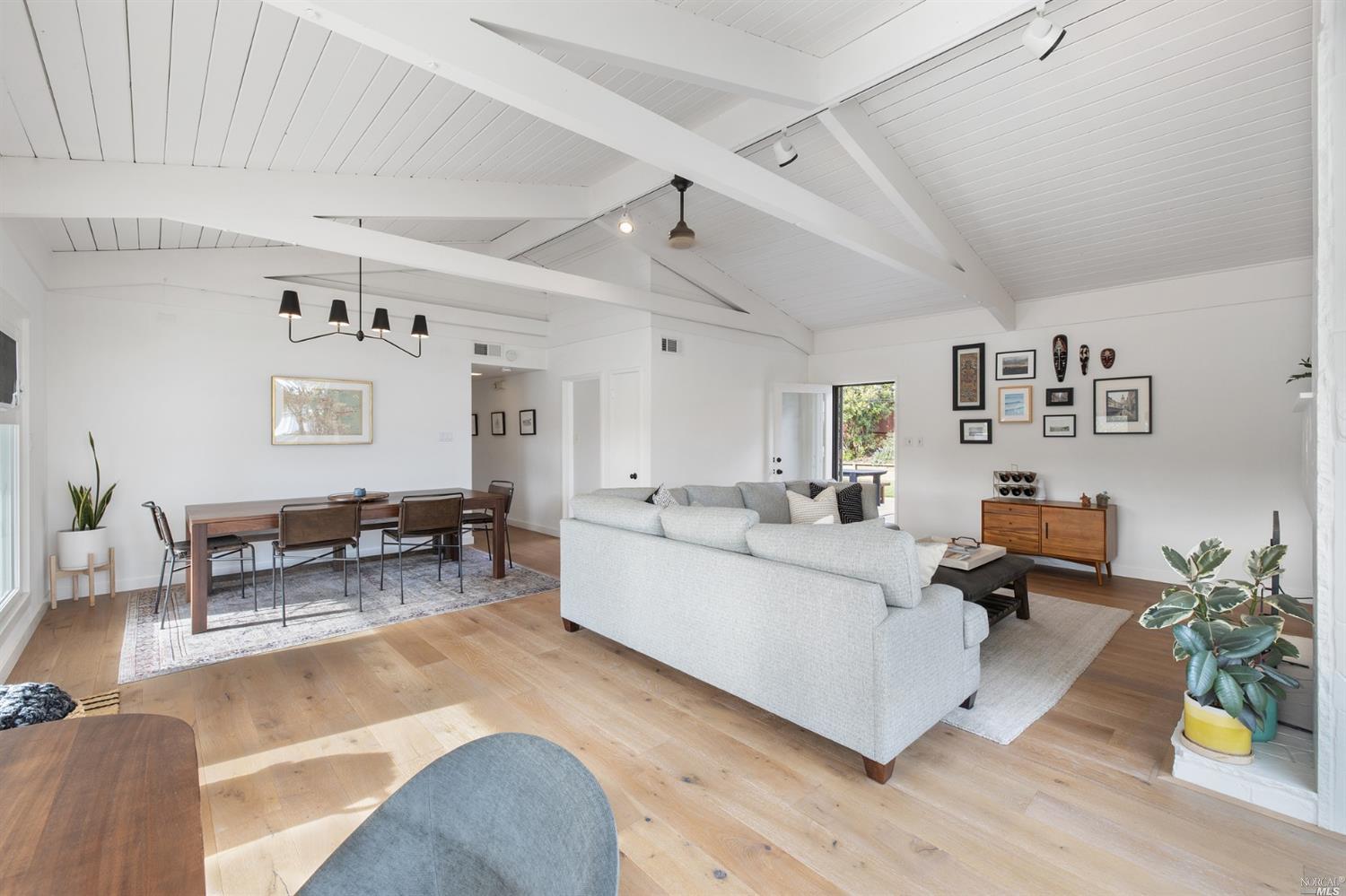 9 Bay Vista Drive Mill Valley, CA 94941 - Photo 11 of 34 a living room with furniture and wooden floor
