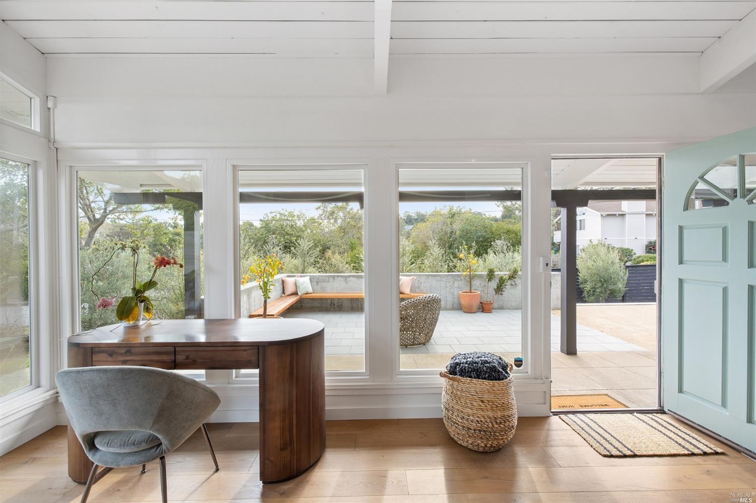 9 Bay Vista Drive Mill Valley, CA 94941 - Photo 12 of 34 a dining room with furniture and large windows