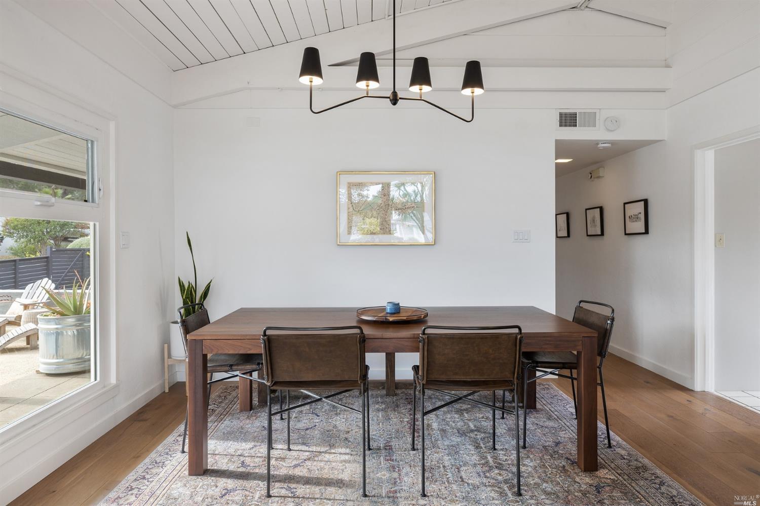 9 Bay Vista Drive Mill Valley, CA 94941 - Photo 14 of 34 a view of a dining room with furniture and window