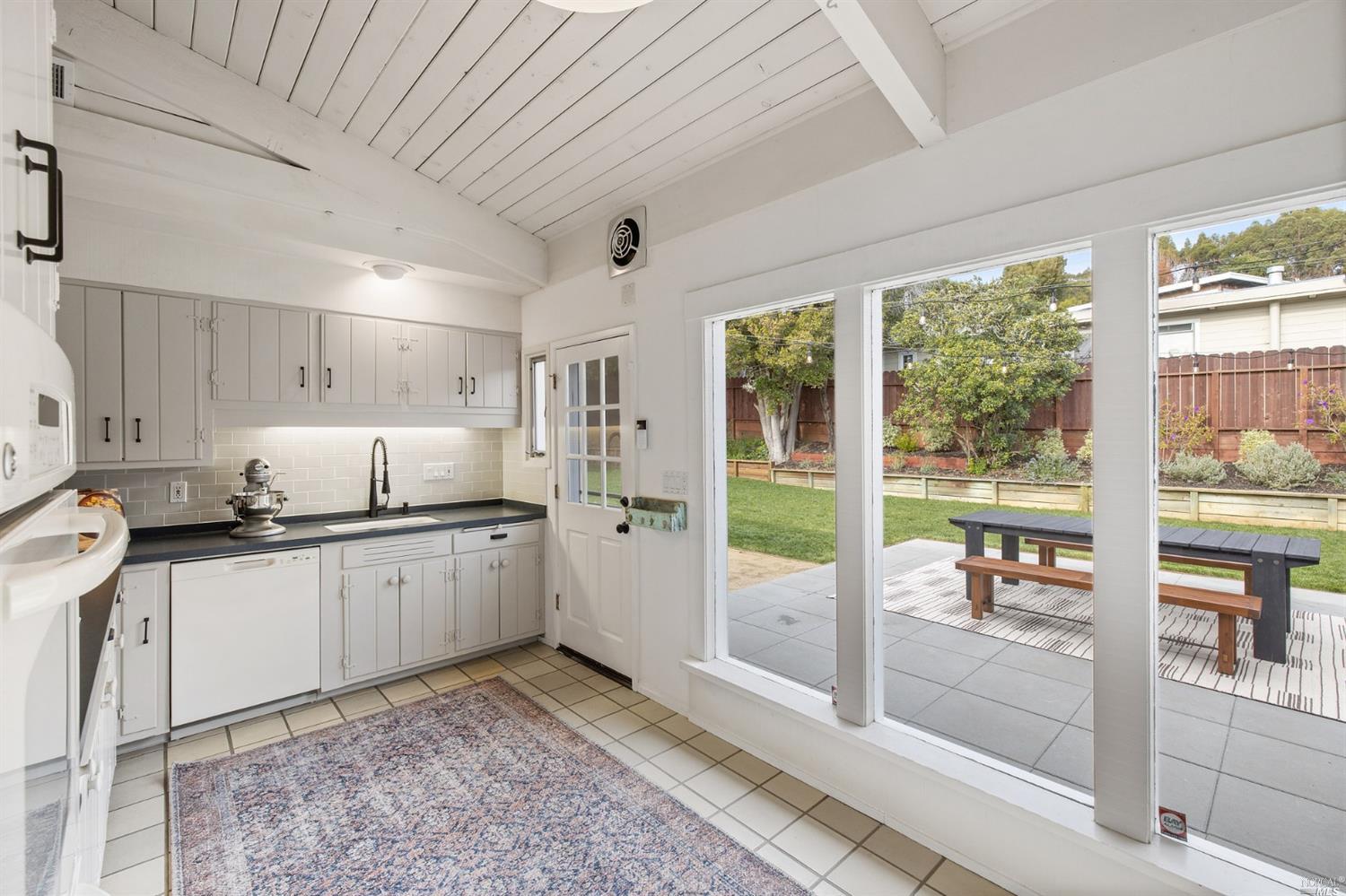 9 Bay Vista Drive Mill Valley, CA 94941 - Photo 16 of 34 a kitchen with a sink and a stove top oven