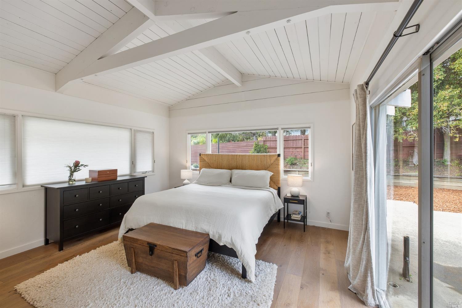 9 Bay Vista Drive Mill Valley, CA 94941 - Photo 19 of 34 a bedroom with a bed and window