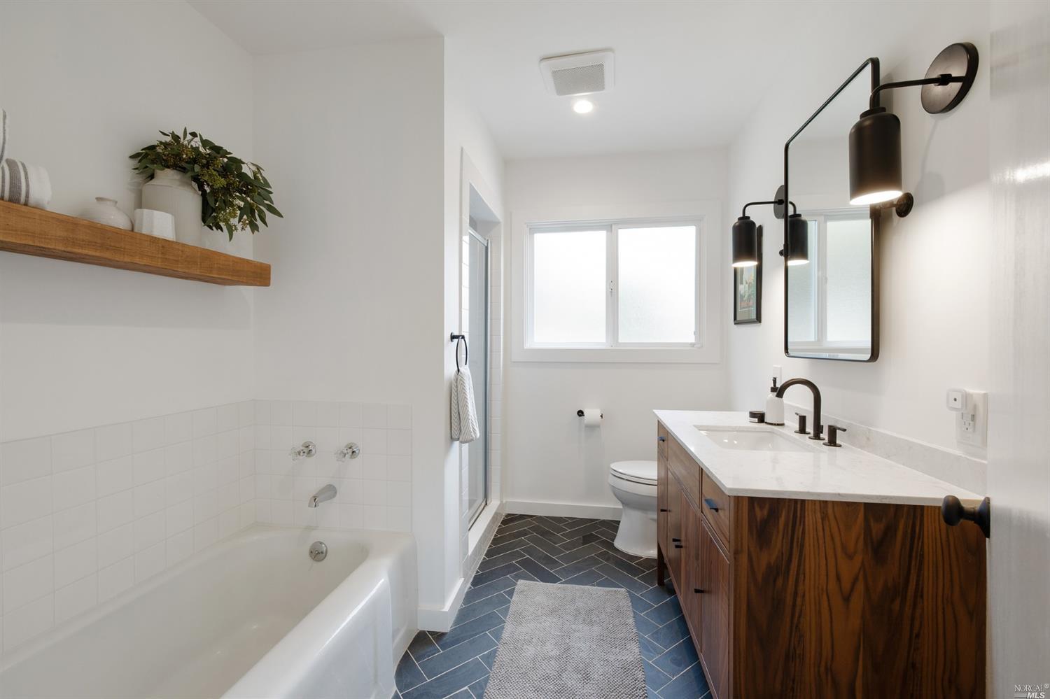 9 Bay Vista Drive Mill Valley, CA 94941 - Photo 22 of 34 a bathroom with a sink and a bathtub