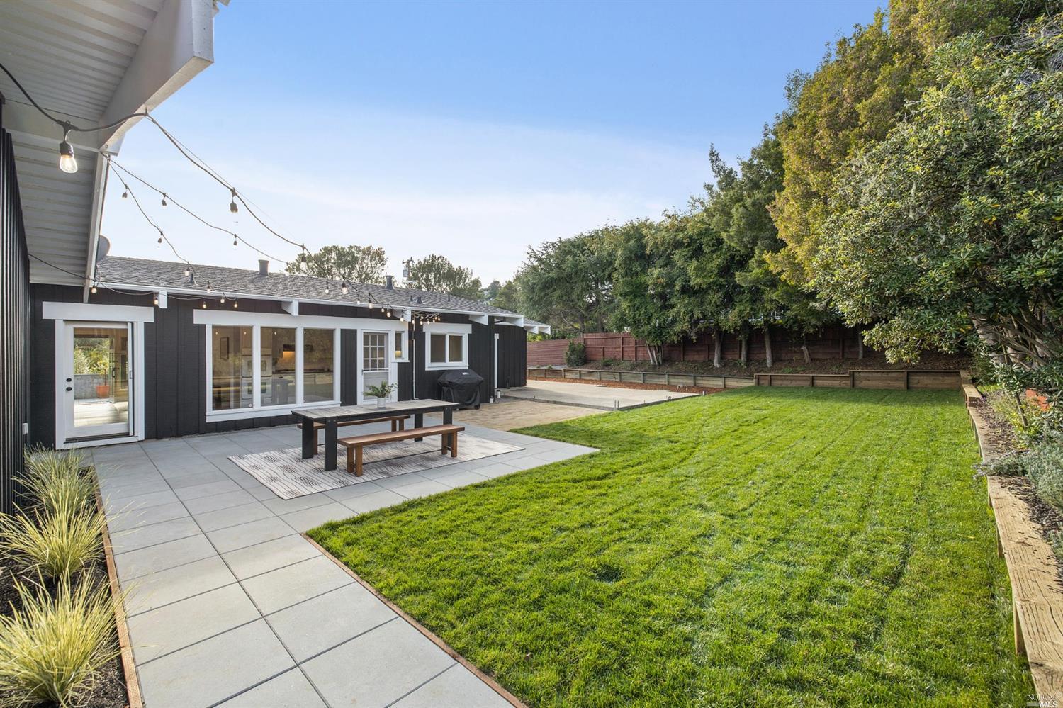 9 Bay Vista Drive Mill Valley, CA 94941 - Photo 26 of 34 a view of a house with backyard and sitting area