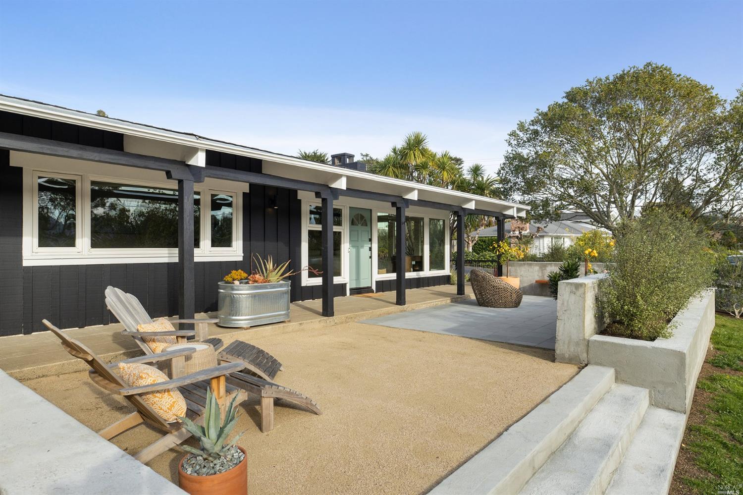 9 Bay Vista Drive Mill Valley, CA 94941 - Photo 5 of 34 a view of a patio with couches table and chairs and potted plants