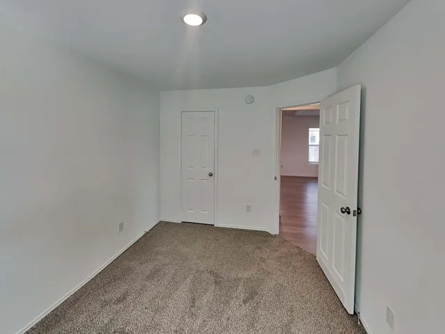a bathroom with a sink and a window