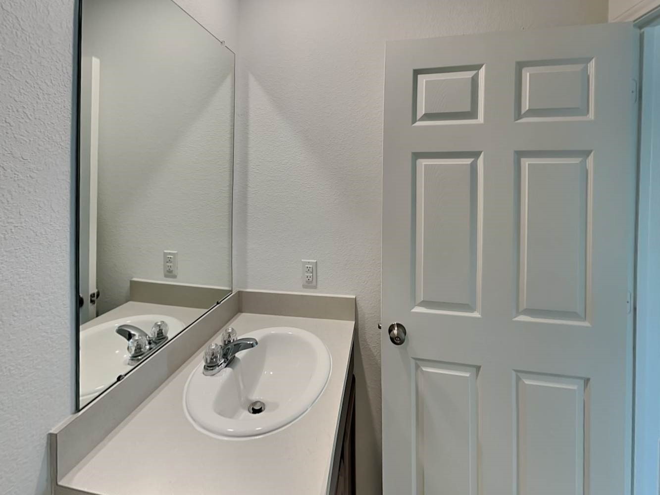 5936 Rimini Landing Lane Porter, TX 77365 - Photo 14 of 15 a bathroom with a sink and a window